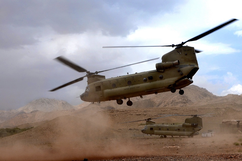 A U.S. Army CH-47 Chinook helicopter from the 101st Airborne Division takes off after dropping supplies at Forward Operating Base Baylough in the Zabul province of Afghanistan to Soldiers with Delta Company, 1st Battalion, 4th Infantry Regiment June 7, 2010. The Soldiers were deployed from the Joint Multinational Readiness Center in Hohenfels, Germany, in support of Operation Enduring Freedom. (U.S. Army photo by Staff Sgt. William Tremblay/Released)