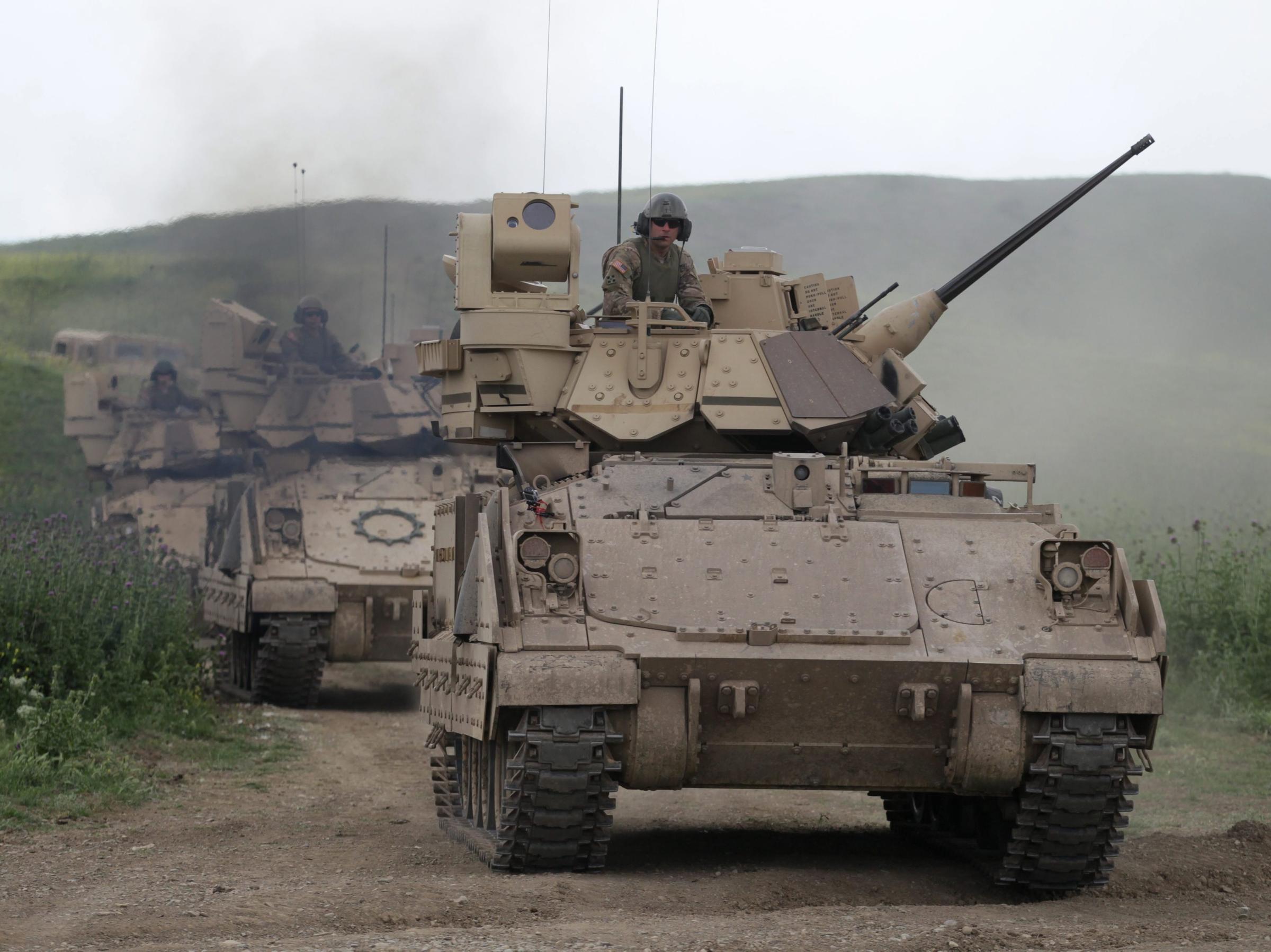 U.S. Bradley fighting vehicles take part in a joint exercise with Georgia at a military base near Tbilisi. Bradleys would be deployed to NATO member states in Eastern Europe and the Baltics if a Pentagon proposal is approved.