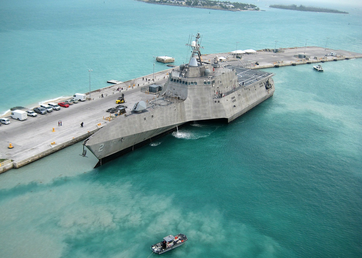 100329-N-1481K-298 KEY WEST, Fla. (March 29, 2010) The Navy's newest littoral combat ship USS Independence (LCS 2) arrives at Mole Pier at Naval Air Station Key West. Independence is on the way to Norfolk, Va., for commencement of initial testing and evaluation of the aluminum vessel before sailing to its homeport in San Diego. Independence is a fast, agile, mission-focused ship specifically designed to defeat "anti-access" threats in shallow, coastal water regions, including surface craft, diesel submarines and mines. (U.S. Navy photo by Naval Air Crewman 2nd Class Nicholas Kontodiakos/Released)