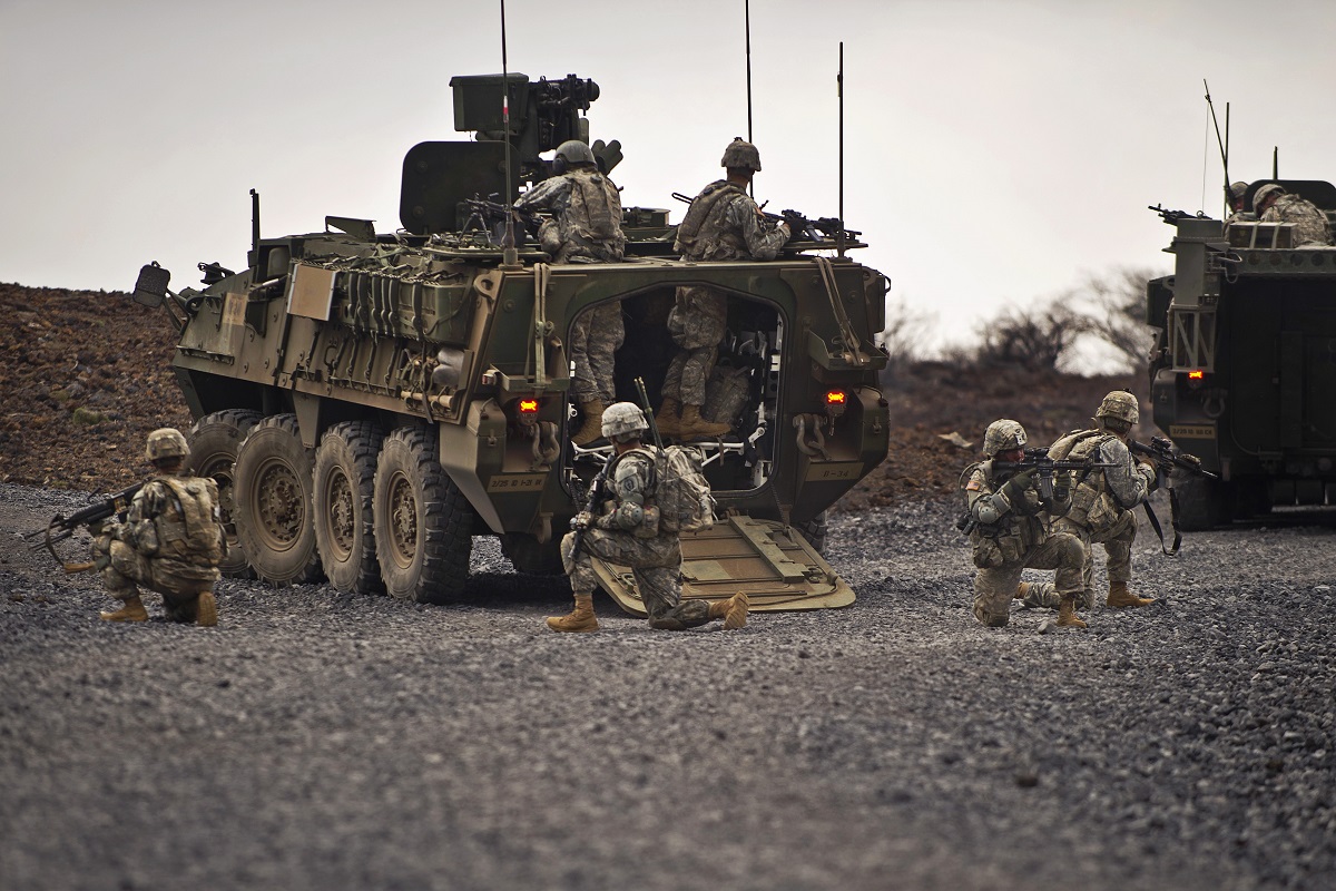 U.S. Army soldiers from Charlie Company, 1st Battalion, 21st Infantry Regiment, 2nd Stryker Brigade Combat Team, 25th Infantry Division, "Gimlets" pull security after dismounting from a M1126 Infantry Carrier Vehicles, (ICV) Sept. 20, 2012, during a live fire exercise at the Pohakuloa Training Area, on Hawaii's Big Island. Soldiers from the 1st Battalion, 21st Infantry Regiment, are conducting a month-long exercise which is focused on platoon level collective training with enabler integration. The training will culminate in a combined arms live fire exercise later this month.
