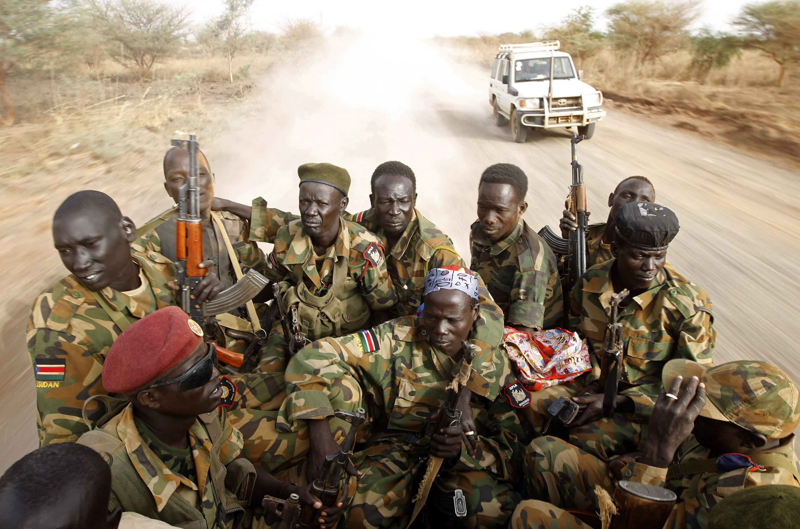 After decades of war, football signals hope. In this photo, South Sudanese soldiers travel by truck near the frontline with Sudan on April 24.