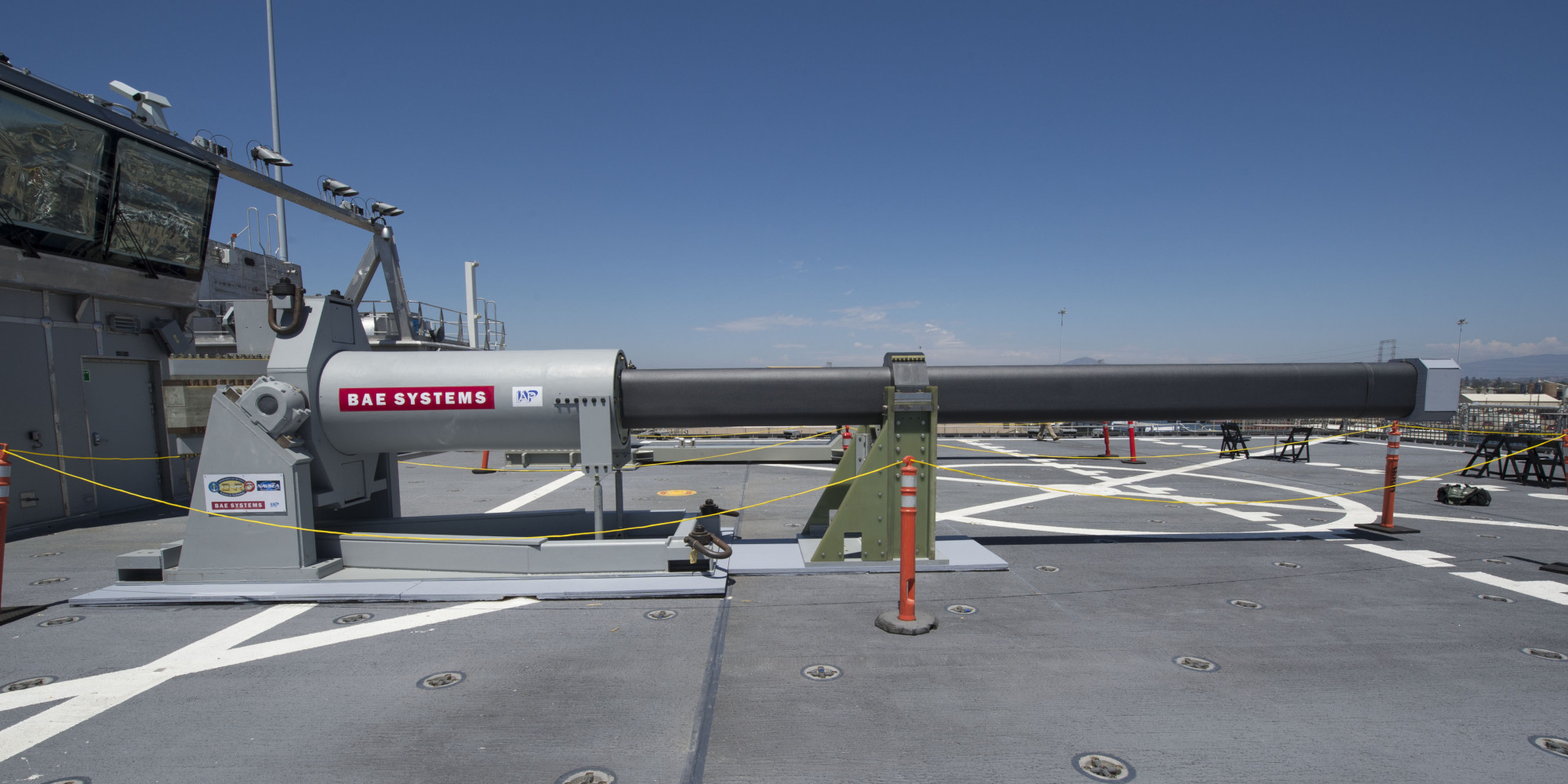 140708-N-ZK869-010 SAN DIEGO (July 8, 2014) One of the two electromagnetic railgun prototypes on display aboard the joint high speed vessel USS Millinocket (JHSV 3) in port at Naval Base San Diego. The railguns are being displayed in San Diego as part of the Electromagnetic Launch Symposium, which brought together representatives from the U.S. and allied navies, industry and academia to discuss directed energy technologies. (U.S. Navy photo by Mass Communication Specialist 2nd Class Kristopher Kirsop/Released)
