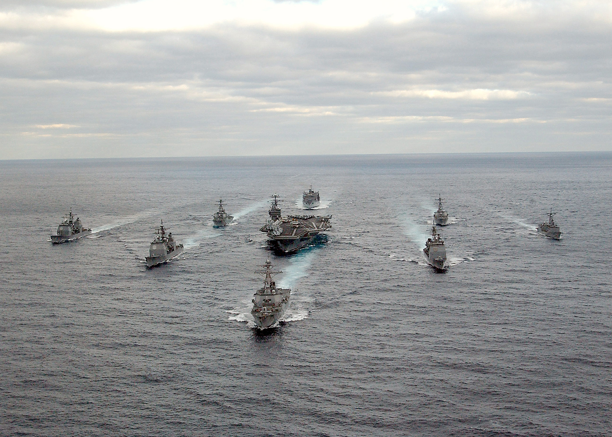 031130-N-3653A-002- Atlantic Ocean (Nov. 30, 2003) -- USS George Washington (CVN 73) Carrier Strike Group formation sails in the Atlantic Ocean. Washington is conducting Composite Training Unit Exercise (COMPTUEX) in preparation for their upcoming deployment. U.S Navy photo by Photographers Mate 2nd Class Summer M. Anderson. (RELEASED)