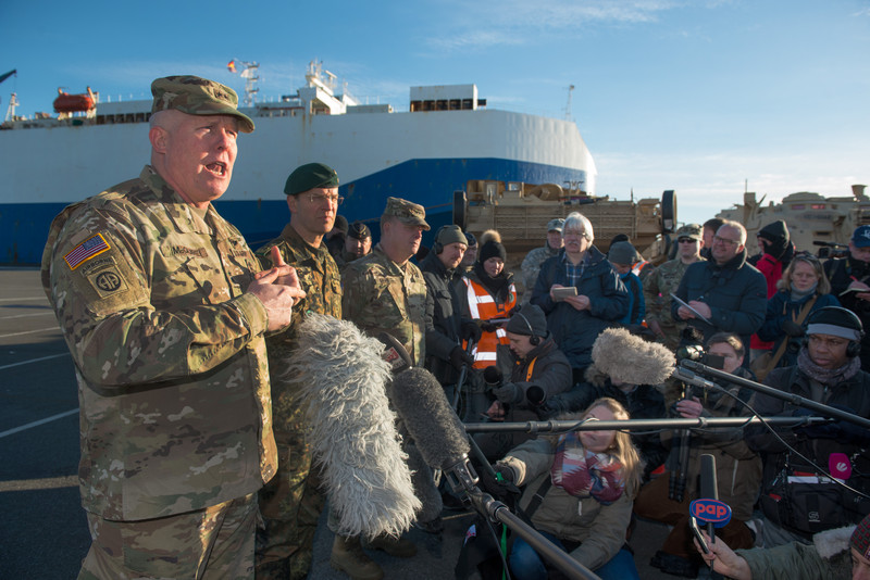 epa05701361 Timothy McGuire (L), Major General and Deputy Commanding General United States Army Europe, gives a statement in Bremerhaven, northern Germany, 06 January 2017. More than 2,500 tanks, trucks and other vehicles of the US Army will be handled in Bremerhaven during what is the biggest troop transfer from the US to Europe since the end of the Soviet Union. The US equipment will be transported to Poland on some 900 railway waggons for the military excercise Atlantic Resolve. EPA/DAVID HECKER