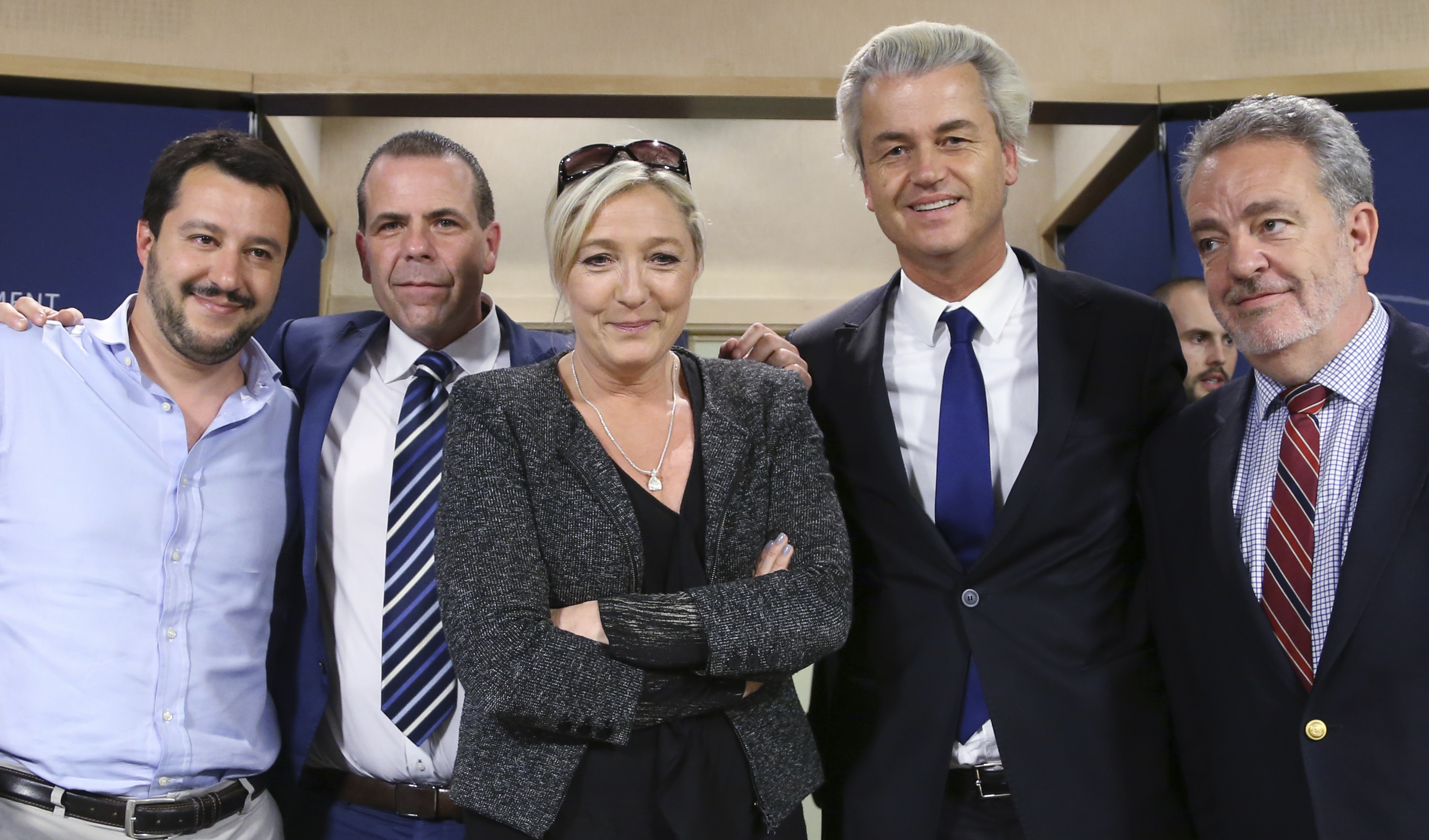 (L-R) Matteo Salvini, Italy's Lega Nord party member, Austria's far-right Freedom Party (FPOe) member Harald Vilimsky, Marine Le Pen, France's National Front political party head, Dutch far-right Freedom Party (PVV) leader Geert Wilders and Belgium's Flemish right wing Vlaams Belang party member Gerolf Annemans pose during a joint news conference at the European Parliament in Brussels May 28, 2014. REUTERS/Francois Lenoir (BELGIUM - Tags: POLITICS ELECTIONS) - RTR3R8ZF